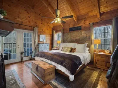 Fall asleep under soaring wood ceilings in a quiet cabin designed for deep rest