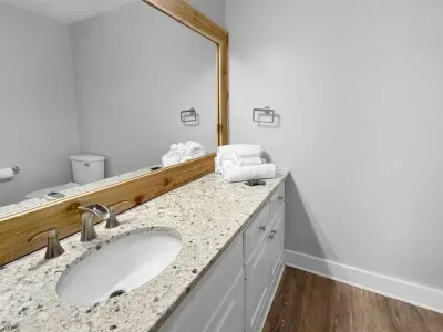A clean, comfortable bathroom where mornings feel easy and evenings wind down without rush.