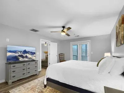 As the day winds down, settle into a peaceful king bedroom—curl up with a show, slow the pace, and rest easy for the night ahead