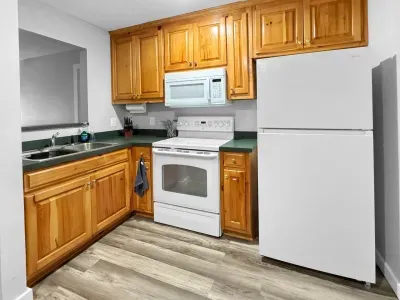 An easy, well-laid-out kitchen where mornings start with coffee and evenings end with something simple on the stove.
