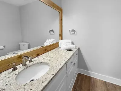 A clean, comfortable bathroom where mornings feel easy and evenings wind down without rush.