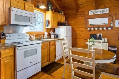 Fully equipped kitchen and dining area, perfect for home-cooked meals.