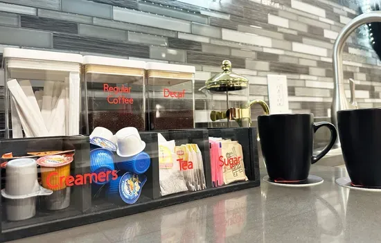 Share morning coffee or evening cocktails at the intimate bar.