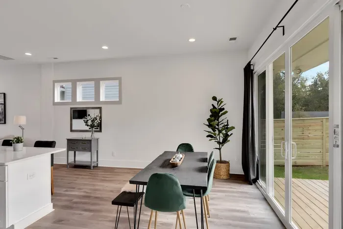 Dining space with patio access and clean, modern lines.