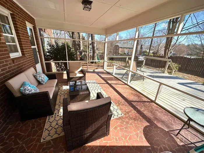 Screened porch to relax and enjoy the peaceful backyard and fresh air.