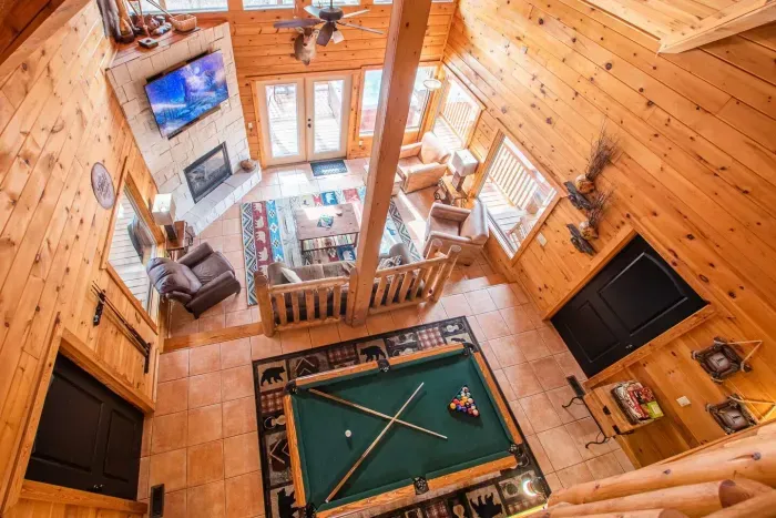 Aerial view of the vaulted ceilings and living room / entertainment space 