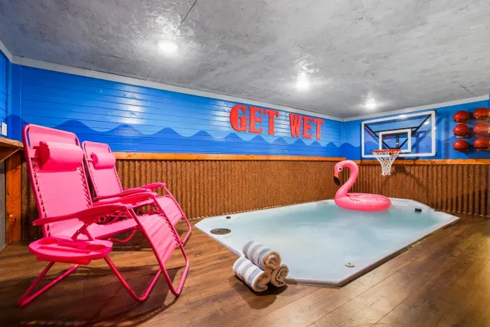 Indoor plunge pool w/ a regulation basketball hoop + pool basketballs, lounge chairs + flamingo float. Right in between the sauna and shower on one side, and the indoor park on the other side, above all of the party shed amenities on the 2nd floor.