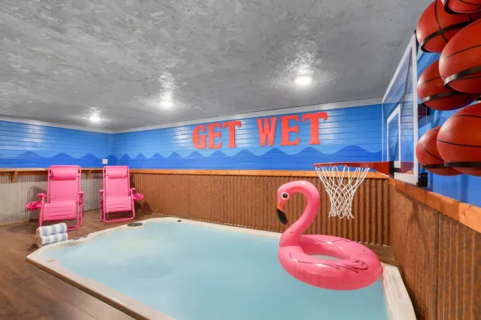 Indoor plunge pool w/ a regulation basketball hoop + pool basketballs, lounge chairs + flamingo float. Right in between the sauna and shower on one side, and the indoor park on the other side, above all of the party shed amenities on the 2nd floor.