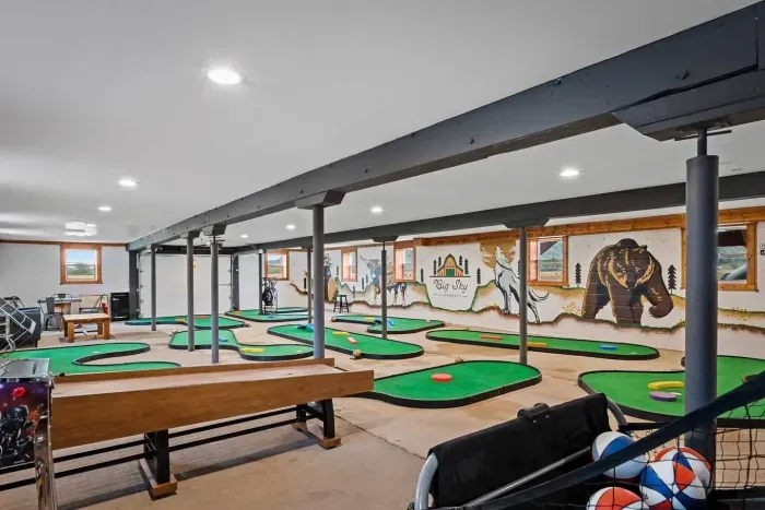Private 9 hole miniature golf course in the barn first floor! Next to an arcade with Skeeball, Pop-A-Shot, and arcade machines.