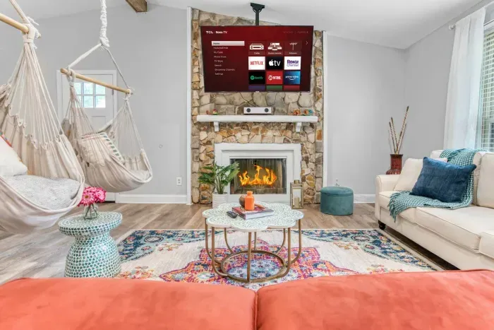 Sit back and relax in the vibrantly furnished living room. 