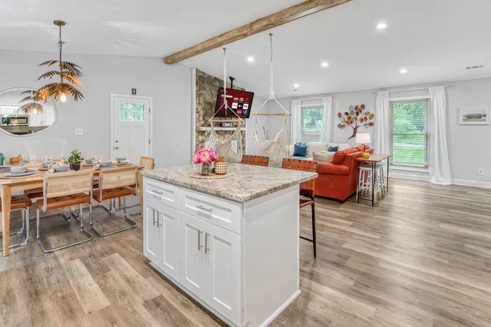 Newly renovated and modern open concept living area. 