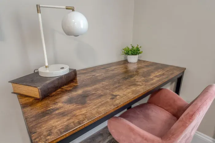 Serene private workspace featuring a comfortable desk, ergonomic chair, and ample lighting—inviting you to dive into work or passion projects in peace.