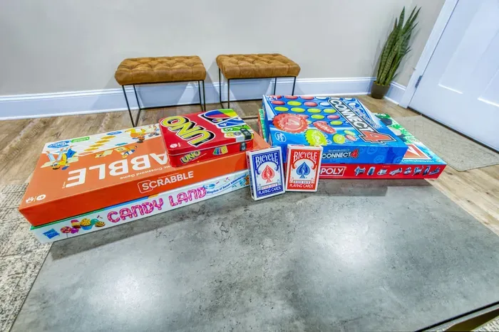 A collection of classic board games, from strategy favorites to fast-paced games, perfect for all ages and guaranteed to bring family and friends together for hours of fun and friendly competition.