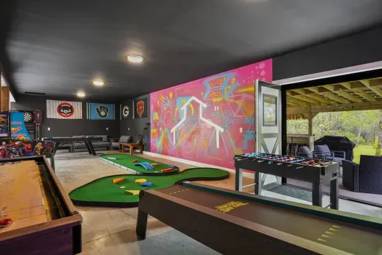 Pool Table, Darts, Cornhole, and a lounge, with access to the back patio
