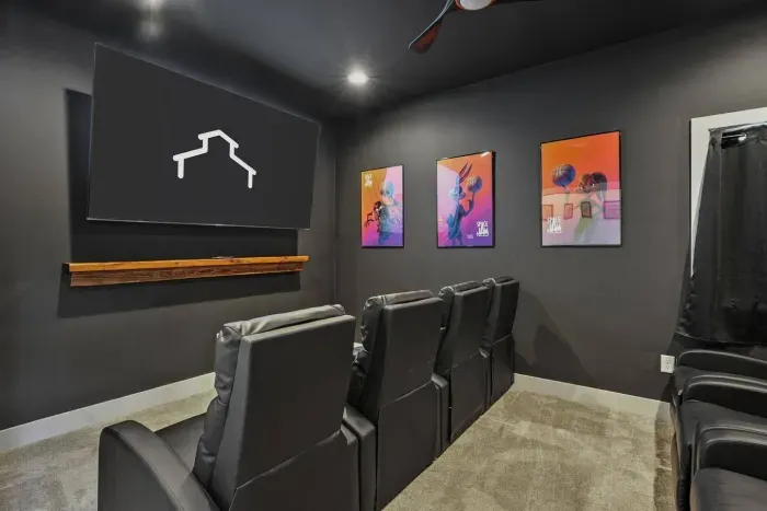 Movie Theater with an 85" TV and 8 leather recliners - Space Jam / Looney Toons!