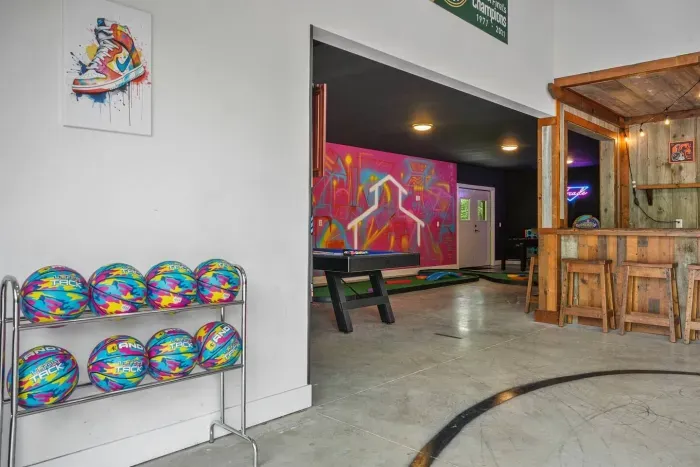 And-1 Basketball rack to match the graffiti murals and custom sport court