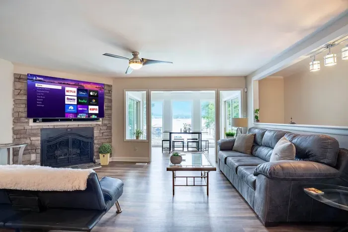 Lots of different places throughout the house to enjoy views of the lake, including the living room.