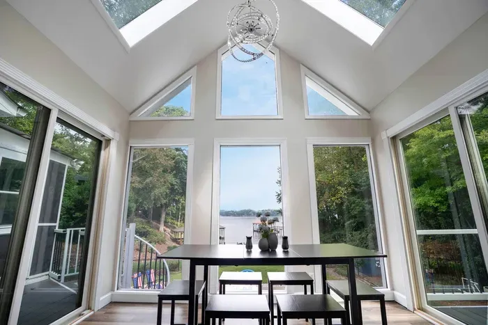 Sun filled dining room overlooking the lake.