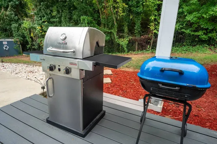 Propane and charcoal grill for our grill masters!