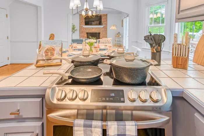 Fully equipped and spacious open concept kitchen including cookware, blender, crockpot, baking trays, coffee machine etc. to feel right at home away from home!