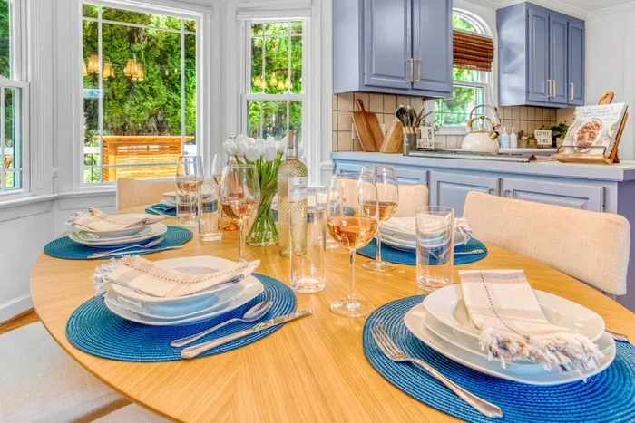 Beautiful airy breakfast nook that flows into the open concept kitchen
