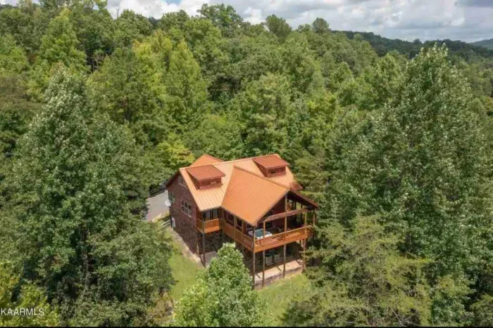 Nestled in the foothills of the Smokies, secluded on a large 1.5 acre property