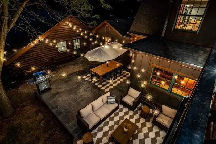 Charming evening view from the balcony showcasing the cozy patio below.