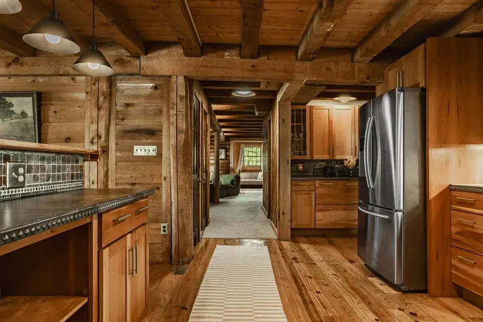 Offering a natural flow into the hallway and living space beyond.