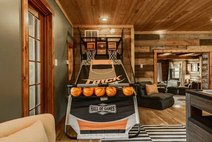 Challenge your family or friends to a friendly basketball shootout in this game room setting.