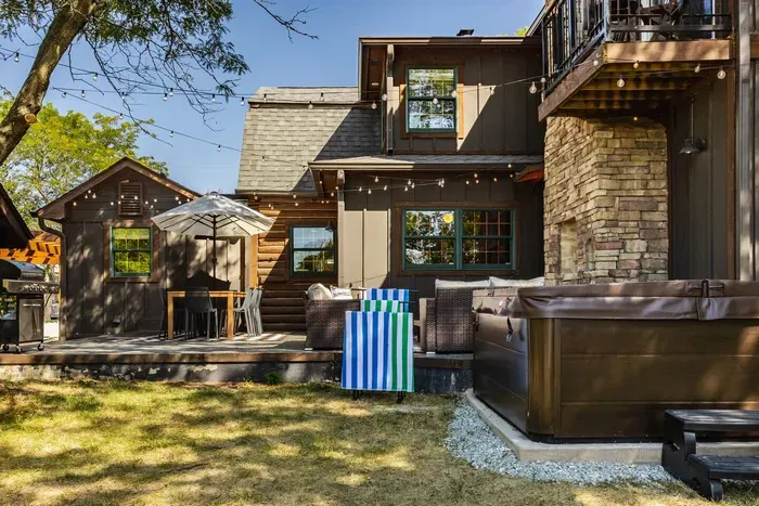 A lounge, hot tub, and dining area, the perfect outdoor setup for you.