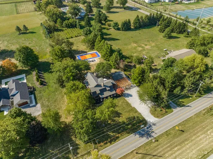 Aerial view showcasing the property’s large yard.