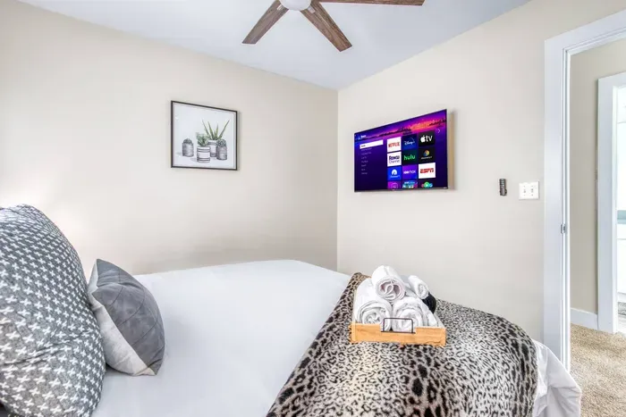 Equipped with a wall-mounted smart TV, perfect for streaming your favorite shows