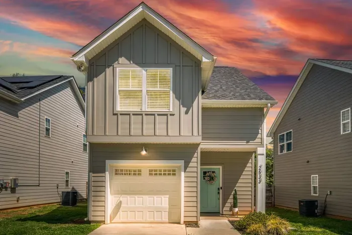 Charming modern home with a private driveway and garage.