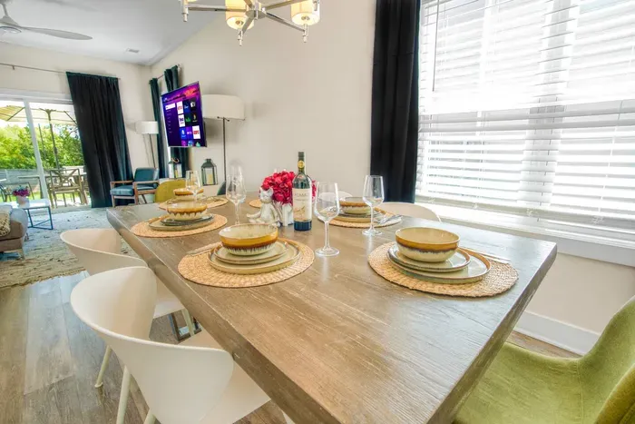 Stylish dining area set for six, perfect for shared meals and relaxed gatherings.