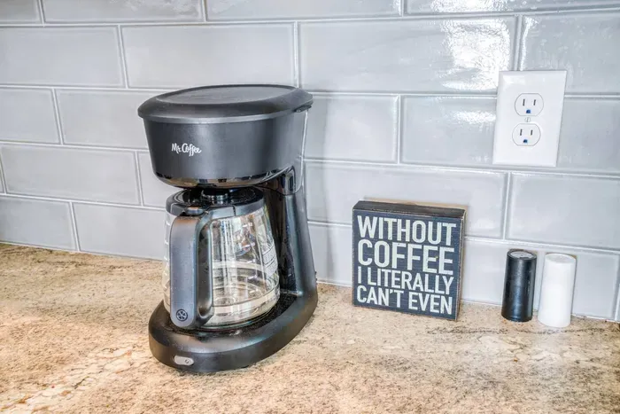 Morning-ready coffee station with a drip coffee maker to start your day right.