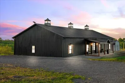 Luxe Barndominium near the bourbon trail with ravishing valley views, 6 bedrooms for up to 20 people, a private golf simulator, your very own movie theater in the barn loft, a hot tub, custom wet bar, pool table, arcade, fire pit, and so much more!