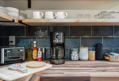 Coffee in the PNW is a must and we provide fresh, French Roast coffee beans, creamer, and sugar. For the tea drinkers, there are options for you, too. :)