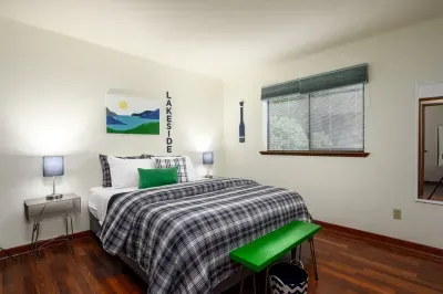 The second first-floor bedroom also has a comfy queen bed and fluffy pillows. :)