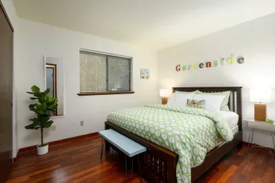 One of two downstairs bedrooms. This room faces the back garden side of the property and has a comfy, queen bed. :)
