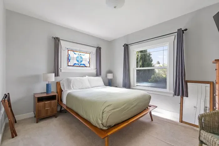 A quiet bedroom designed for slow mornings and restful nights.