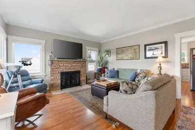 Relax in a bright and inviting living room after a day exploring Everett.