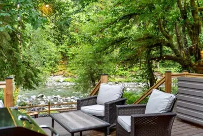 This spacious deck covers everything! You can sit and relax with your beverage of choice, grill your dinner, or have a soak in the hot tub. :)