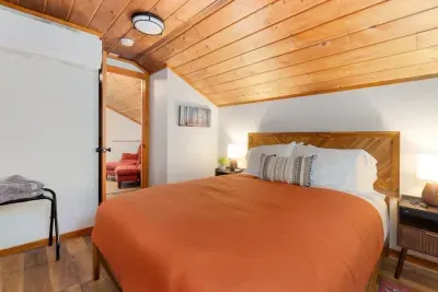 The bedroom with a river view! Love this cozy bedroom that has a queen bed with a memory foam mattress for your comfort. :) The view is a big bonus!