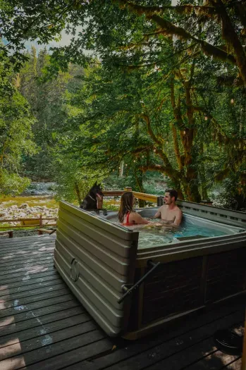 Hot tub with your honey overlooking the river...what's not to love? Oh, and your sweet pup is always welcome. Just not in the tub. :D