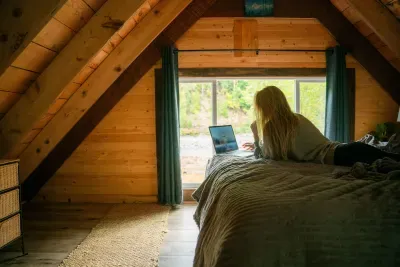 This is the main queen bed on the higher loft level. The river sounds, comfy mattress, high-end linens, and hotel-quality pillows make for a great night of sleep.
