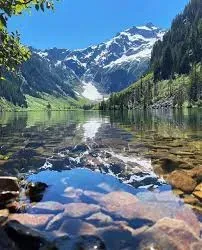 The Goat Lake Trail is a moderate, 11 mile hike through beautiful forests, past stunning falls, and leads you to this beautiful view. :)