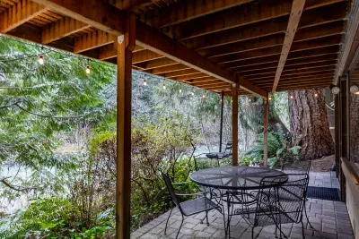 The downstairs patio is where you'll find the hot tub and this little dining area. :)