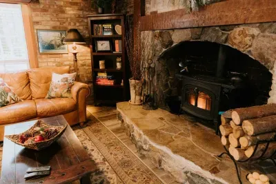 The most beautiful stone fireplace and the warmest wood stove make for the coziest Fall and Winter nights. :)