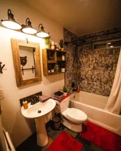 Your bathroom is stocked with plush towels, organic bath products and a full-size washer and dryer for your use. We also provide the laundry detergent and dryer sheets. :)