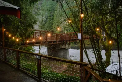 String lights add a little magic to this beautiful oasis and light your way down to the river and fire pit. 